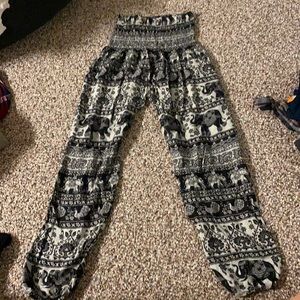 Goucho like pants. Aztec design. Go high up.